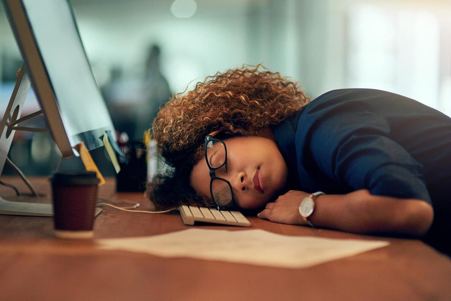 A person working a night shift under artificial light